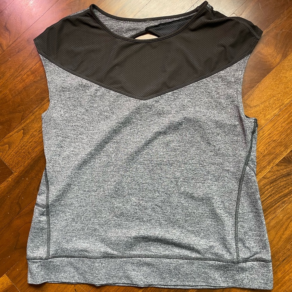 Lucy athletic sleeveless top with crossover design in back, see measurements